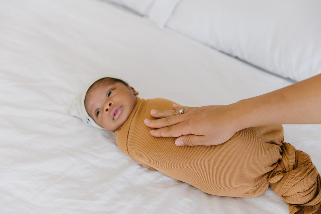 How to Help a Baby Who Hates Swaddling