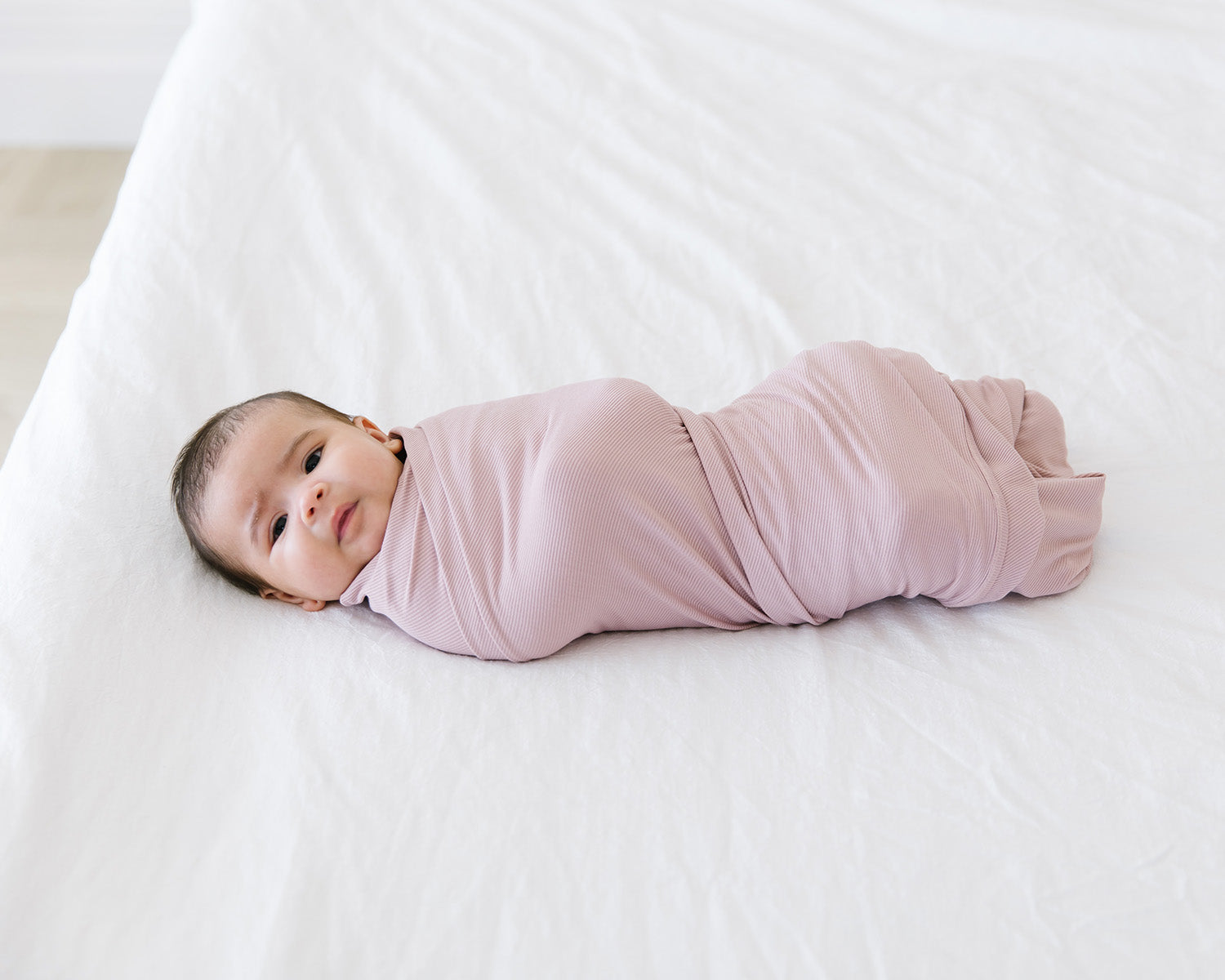 blush ribbed stretchy swaddle blanket