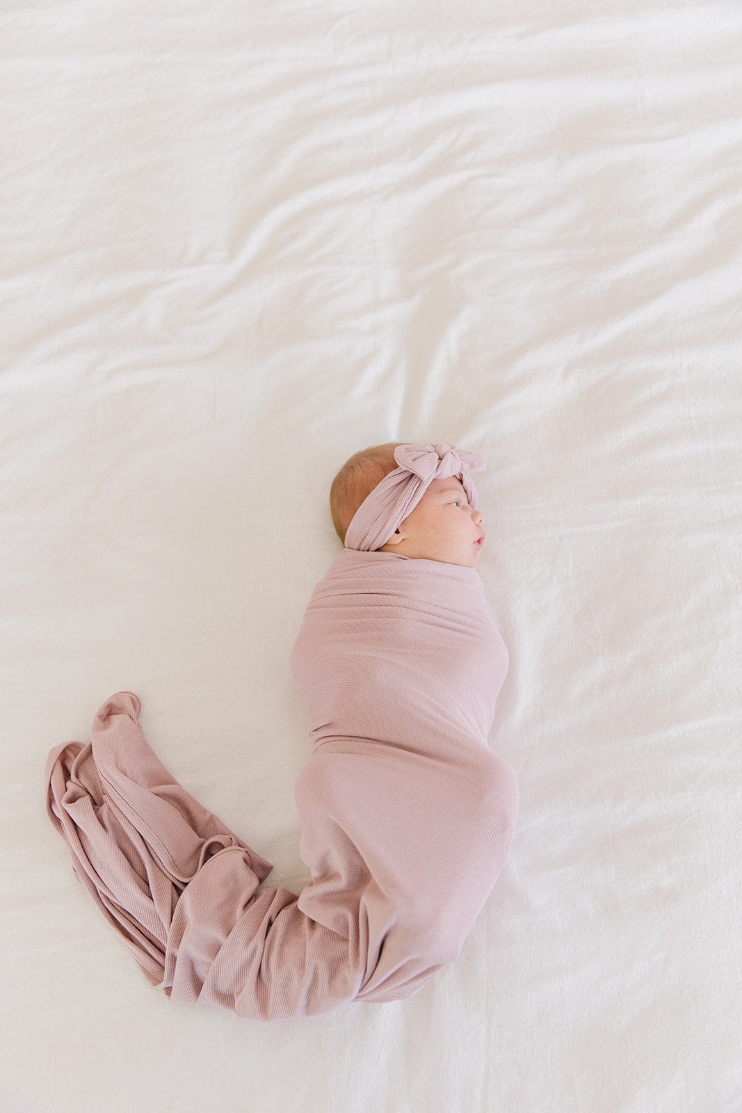 blush ribbed stretchy swaddle blanket