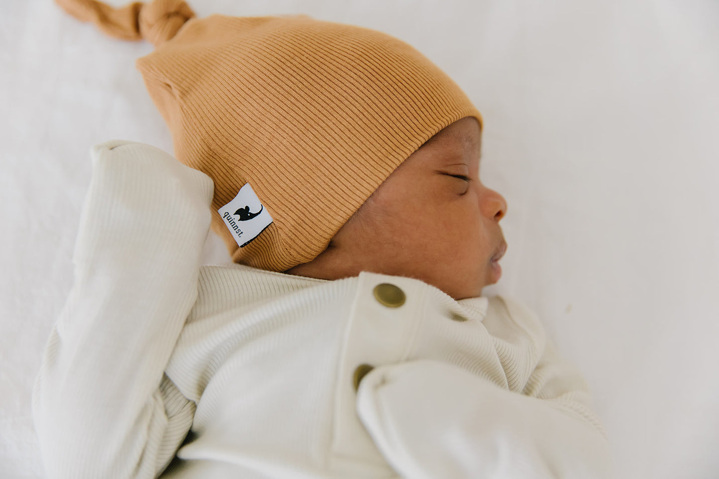 camel ribbed top knot hat